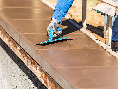 Stamped Concrete vs. Pavers: Pros & Cons
